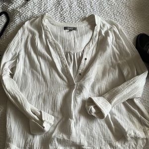 Deeep V neck white linen shirt with fringe detail